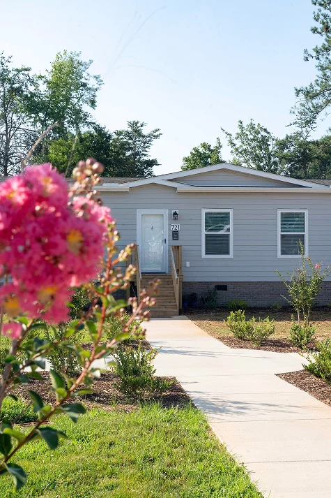 House exterior with flowers